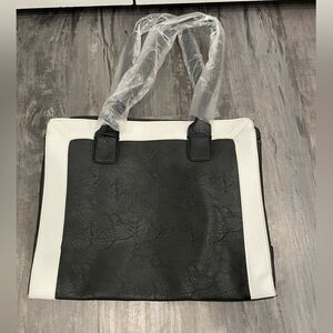 Brand new black and white purse 10x12 inches